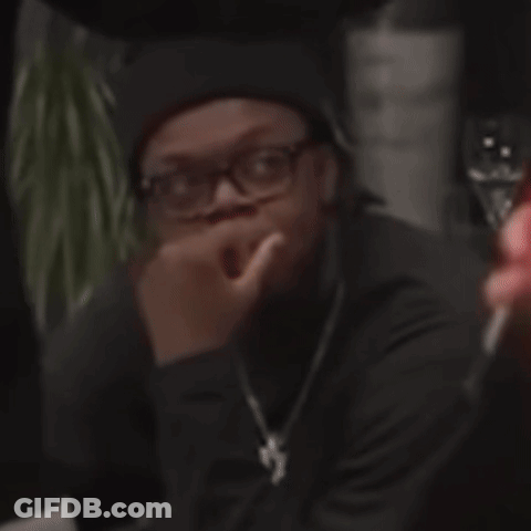 Man In Glasses And Black Hat Sitting With Hand On Nose GIF