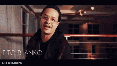Man In Glasses And Black Jacket By Railing GIF