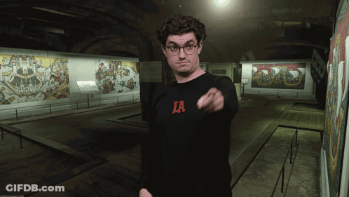 Man In Glasses And Black La Shirt GIF