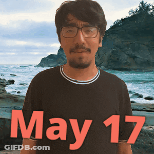 Man In Glasses And Black Shirt By Ocean GIF