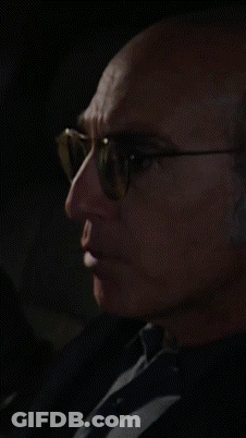 Man In Glasses And Black Shirt By Window GIF