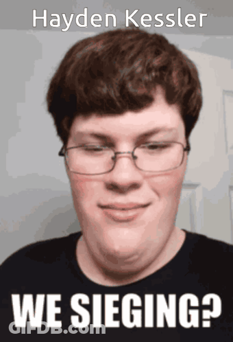 Man In Glasses And Black Shirt Hayden Kessler GIF