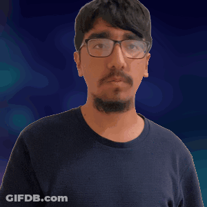 Man In Glasses And Black Shirt Making Gesture GIF
