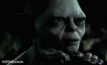 Man In Glasses And Black Shirt Making Hand Gesture GIF