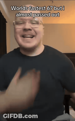 Man In Glasses And Black Shirt Saying Fastest GIF