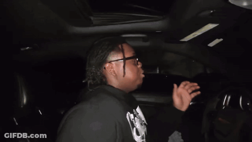 Man In Glasses And Black Shirt Saying I Love You GIF