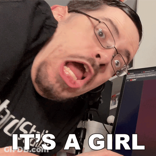 Man In Glasses And Black Shirt Saying It's A Girl GIF