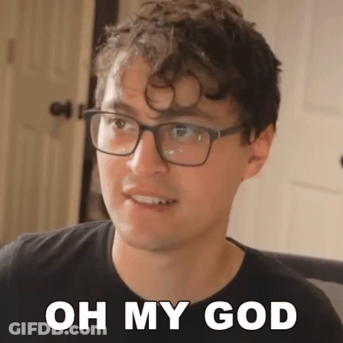 Man In Glasses And Black Shirt Saying Oh My God GIF