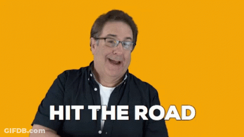 Man In Glasses And Black Shirt Says Hit The Road GIF