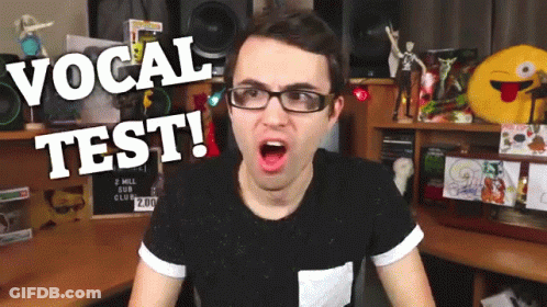 Man In Glasses And Black Shirt Vocal Test GIF