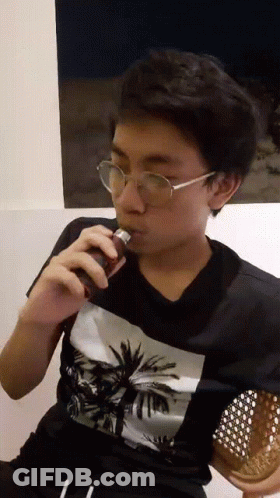 Man In Glasses And Black Shirt With Palm Tree GIF