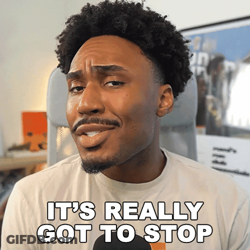 Man In Glasses And Black Sweater Urging Stop GIF