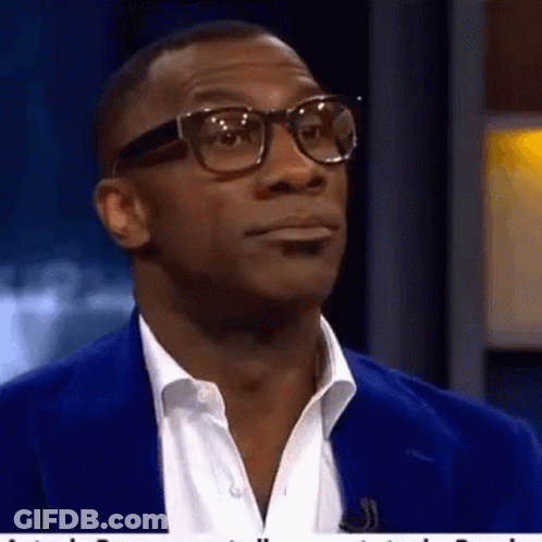 Man In Glasses And Blue Jacket Looking Up GIF