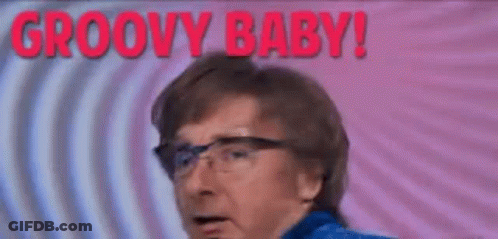 Man In Glasses And Blue Jacket Making Funny Face GIF