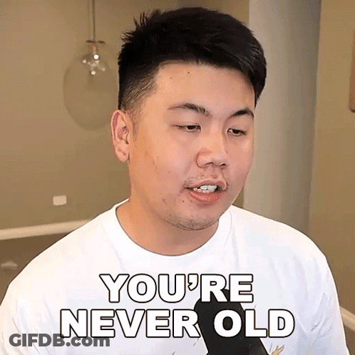 Man In Glasses And Blue Jacket With Shunver 24K GIF