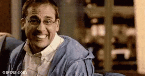 Man In Glasses And Blue Robe Smiling GIF