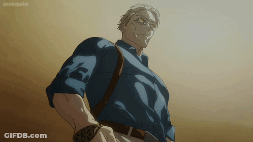 Man In Glasses And Blue Shirt In Front Of Animepathe Screen GIF