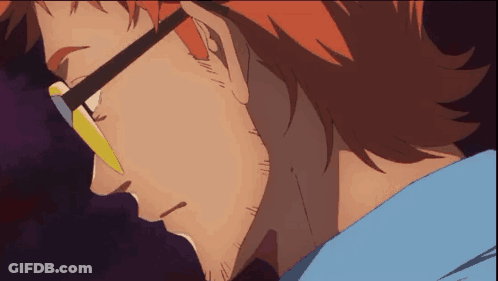 Man In Glasses And Blue Shirt Looking Down GIF