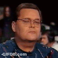 Man In Glasses And Blue Shirt Making A Face GIF