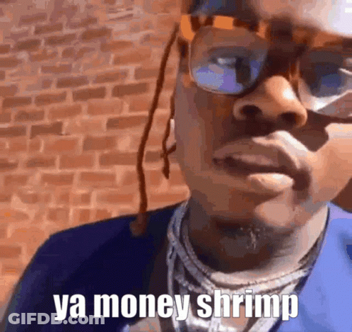 Man In Glasses And Blue Shirt Saying Ya Money Shrimp GIF
