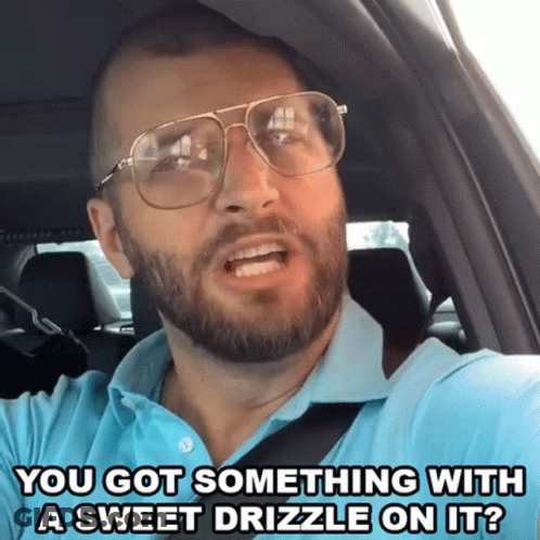 Man In Glasses And Blue Shirt Saying You Got Something With A Sweet Drizzle GIF