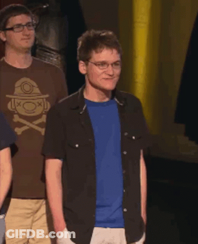 Man In Glasses And Blue Shirt With Acksyzu Sticker GIF