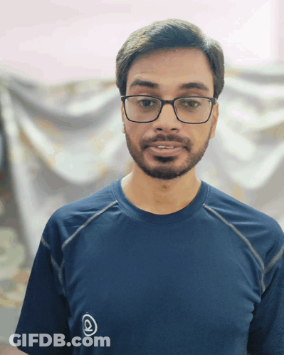 Man In Glasses And Blue Shirt With White Circle GIF