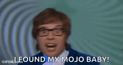 Man In Glasses And Blue Suit Saying I Found My Mojo Baby GIF