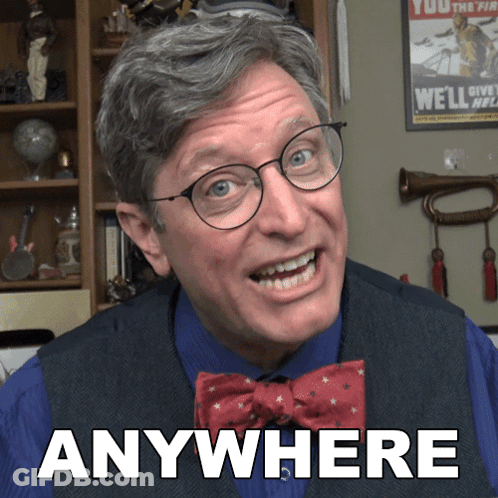 Man In Glasses And Bow Tie Saying Anywhere GIF