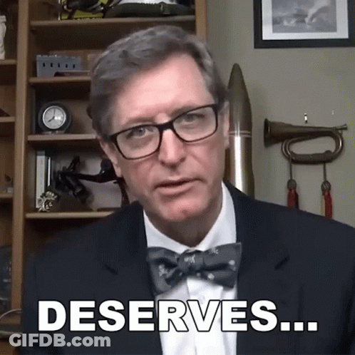 Man In Glasses And Bow Tie Saying Deserves GIF