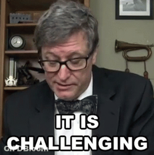 Man In Glasses And Bow Tie Says It Is Challenging GIF