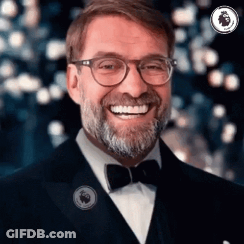 Man In Glasses And Bow Tie Smiling GIF