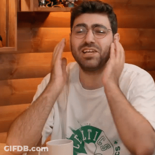 Man In Glasses And Celtics Shirt Clapping GIF