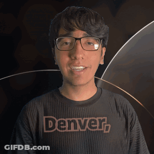 Man In Glasses And Denver Shirt Smiling GIF