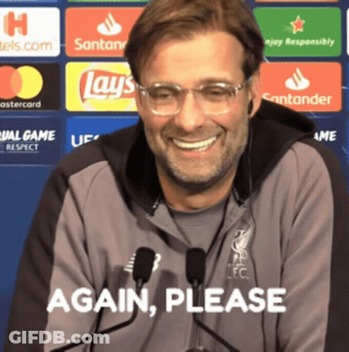 Man In Glasses And Gray Jacket Smiling Saying Again Please GIF