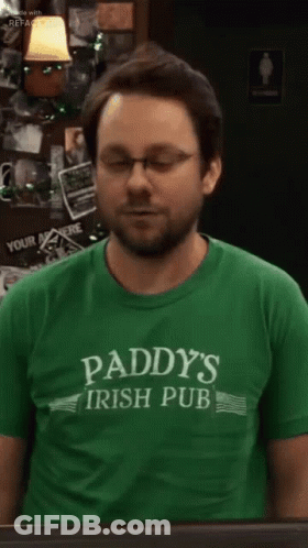 Man In Glasses And Green Paddy's Irish Pub Shirt GIF