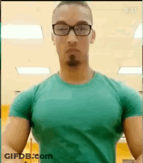 Man In Glasses And Green Shirt Posing GIF