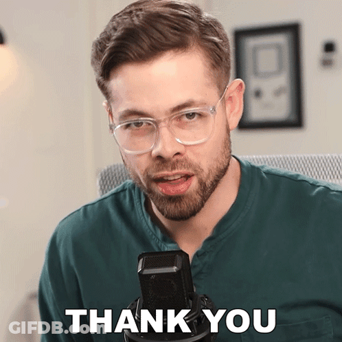 Man In Glasses And Green Shirt Says Thank You GIF