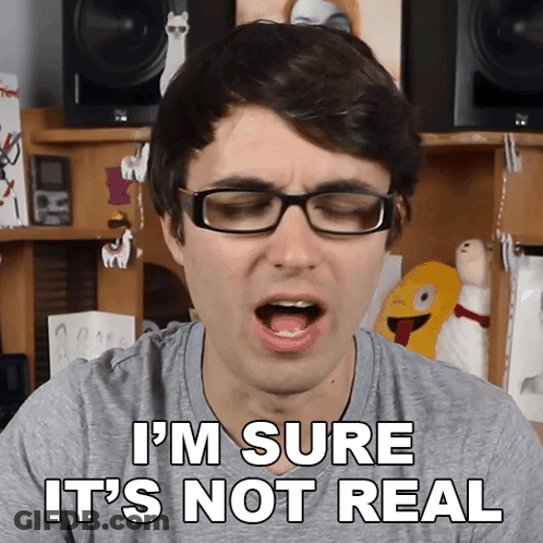 Man In Glasses And Grey Shirt Says I'm Sure It's Not Real GIF