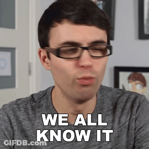 Man In Glasses And Grey Shirt Says We All Know It GIF