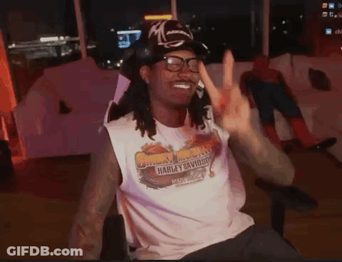 Man In Glasses And Harley Davidson Shirt Giving Peace Sign GIF