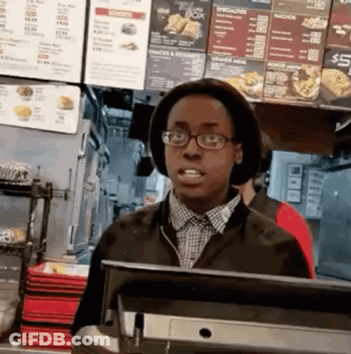 Man In Glasses And Hat In Restaurant GIF