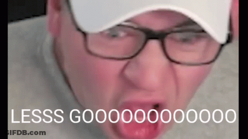 Man In Glasses And Hat Making Funny Face GIF