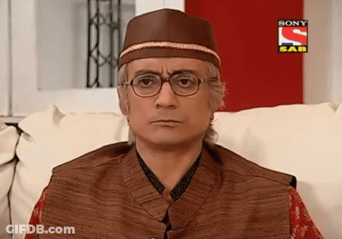 Man In Glasses And Hat On Couch With Sony SAB Ad GIF