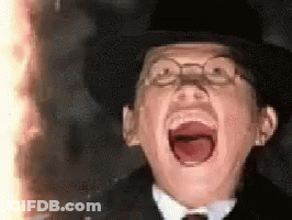 Man In Glasses And Hat Screaming With Mouth Open GIF