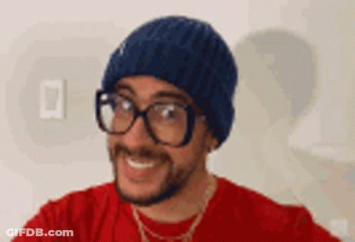 Man In Glasses And Hat Smiling GIF