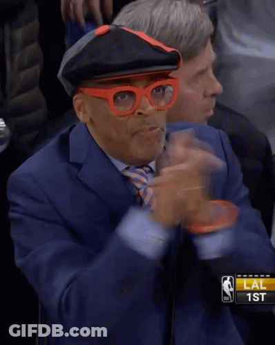 Man In Glasses And Hat Thumbs Up At Basketball Game GIF