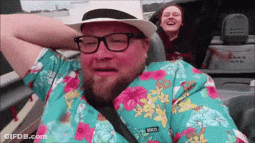 Man In Glasses And Hawaiian Shirt With Rem275 Patch GIF