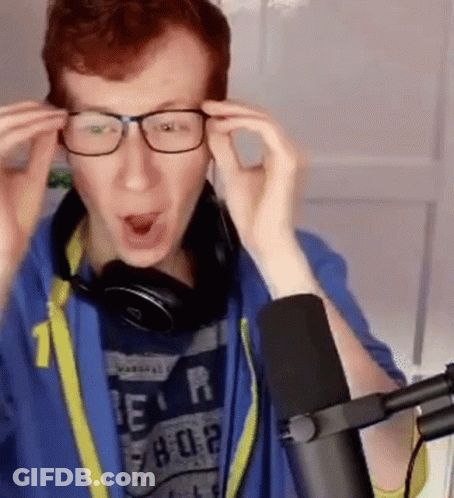 Man In Glasses And Headphones At Microphone GIF
