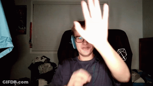 Man In Glasses And Headphones Raises Hand GIF
